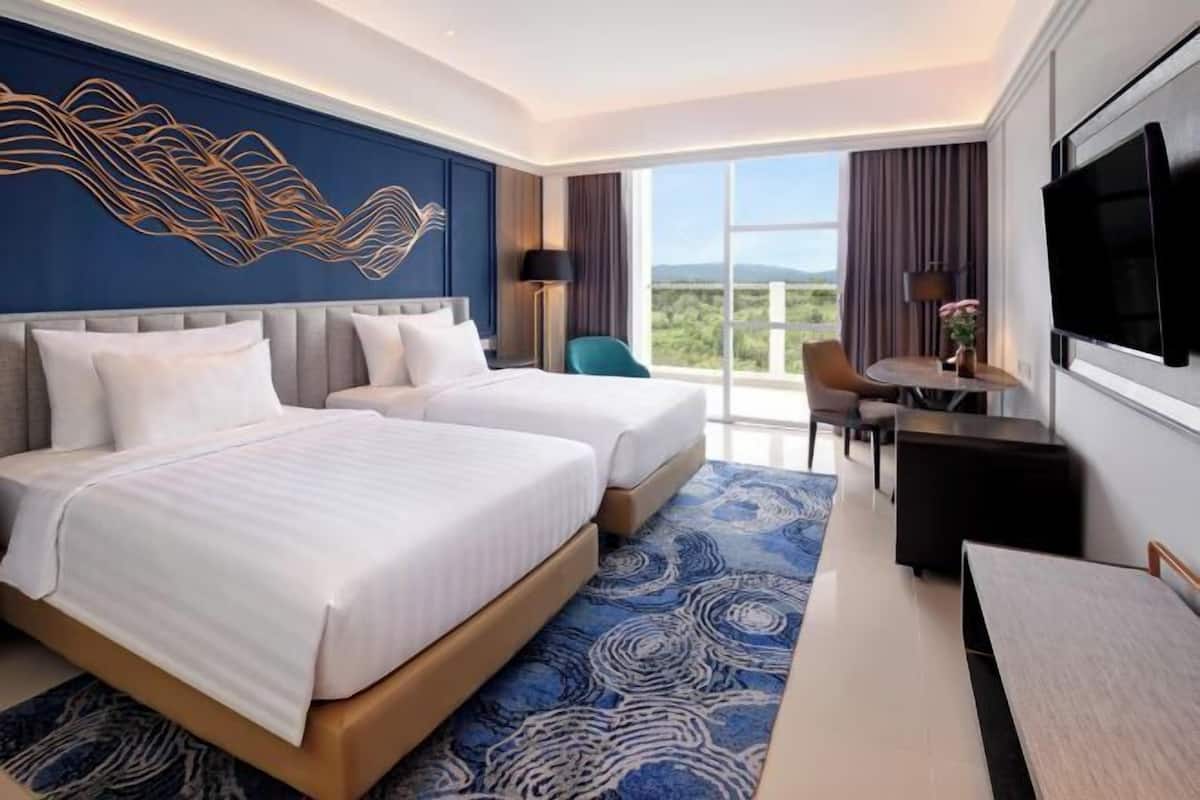 Premium bedding, down duvets, memory-foam beds, minibar