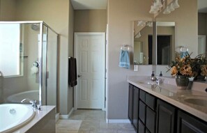 Combined shower/tub, hair dryer, towels, soap
