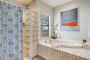 Combined shower/tub, hair dryer, towels, soap