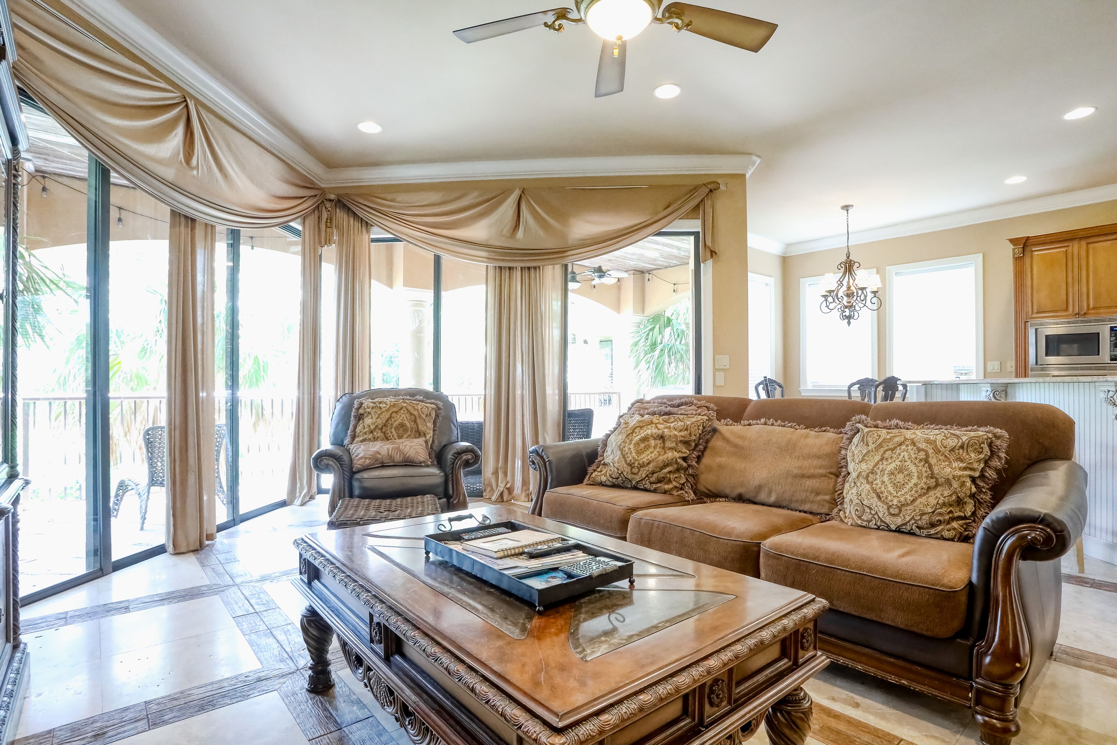 Elegant coastal villa with spacious patio, pool, hot tub, free WiFi & central AC