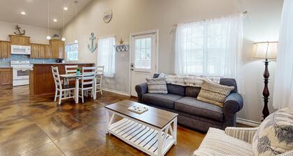 Coastal hideaway with fenced yard, firepit, central AC, & W/D - dog-friendly
