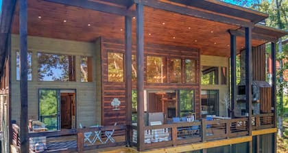 Dog Friendly Lodge near town with screened deck, hot tub, game room & WiFi