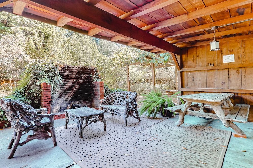 Waterfront cabin with private hot tub, beach access & river views - dog-friendly