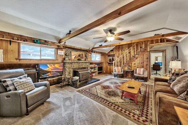 Smart TV, fireplace, foosball, books
