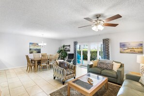 Flat-screen TV - 🌴 Updated 2-Bedroom Condo with Intracoastal Views & Ground-Level Convenience – Indian Rocks Beach (Indian Rocks Beach)