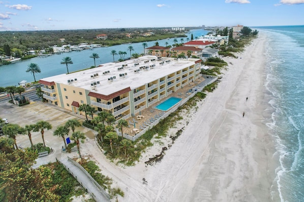 Enjoy stunning ocean views from the comfort of your balcony, with access to a spacious pool area and the sandy beach.