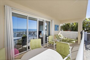 Terrace/patio - 🌴 Coastal Charm Meets Panoramic Beachfront Views – 2BR Corner Unit in Indian Rocks Beach (Indian Rocks Beach)