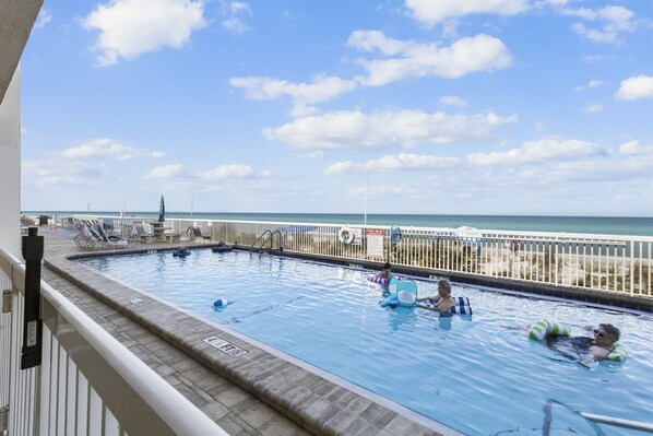 A heated pool - 🌊 Beachfront 2BR Condo with Direct Pool Access – Steps to the Sand, Sleeps 6 - Indian Rocks Beach (Indian Rocks Beach)