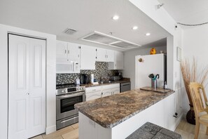 Fridge, microwave, oven, stovetop - 🐚 Beachfront Escape for Two – Gulf Views & Cozy Comfort 1BR/1BA  Sleeps 2  Fifty Gulfside – Indian Rocks Beach (Indian Rocks Beach)