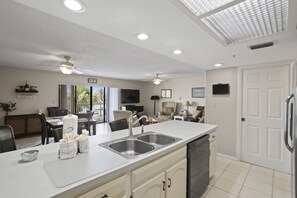 Fridge, microwave, oven, stovetop - 🌴 Intracoastal Views & Beachside Comfort – Spacious 2BR Condo 2BR/2BA  Sleeps 4  Fifty Gulfside – Indian Rocks Beach (Indian Rocks Beach)