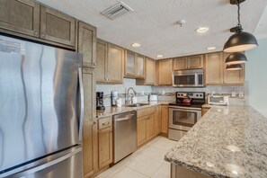 Fridge, microwave, oven, stovetop - 🌅 Unit #313 – Gulf Front Elegance with 180° Views & Island Comfort 1BR/1BA  Sleeps 4  Fifty Gulfside – Indian Rocks Beach (Indian Rocks Beach)