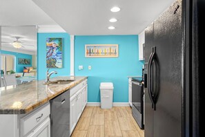 Coffee/tea maker, fridge, microwave, oven
