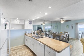 Fridge, microwave, oven, stovetop - 🌅 Panoramic Gulf Views – Spacious 3BR Beachfront Condo 3BR/2BA  Sleeps 8  Fifty Gulfside – Indian Rocks Beach (Indian Rocks Beach)