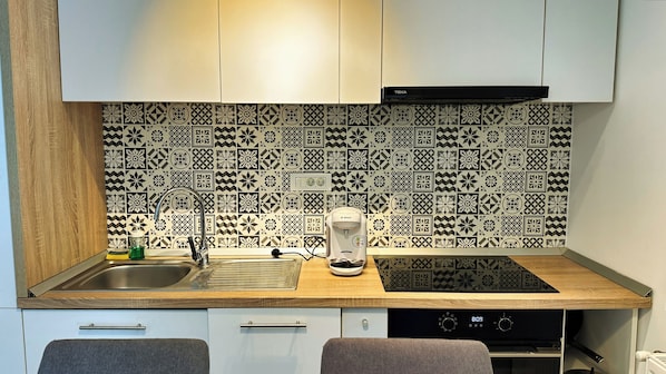 Departamento urbano, 1 cama King size y sofá cama, para no fumadores, cocina | Cocina privada | Refrigerador con congelador, horno, parrilla de estufa y lavavajillas 