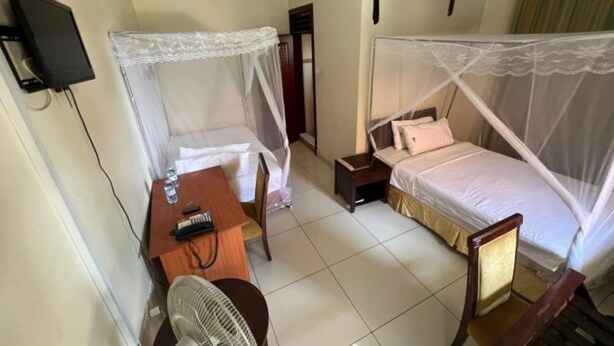Blackout drapes, WiFi (free), bed sheets - Century Hotel Kamuli (Kamuli)