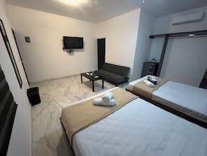 Suite studio familiale | Décor unique, ameublement unique, système d’insonorisation