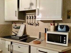 Fridge, microwave, coffee/tea maker, toaster