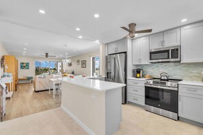 Open kitchen that flows into the living area - Lido Sky Suite | Gulf Views, Across From Beach (Sarasota)