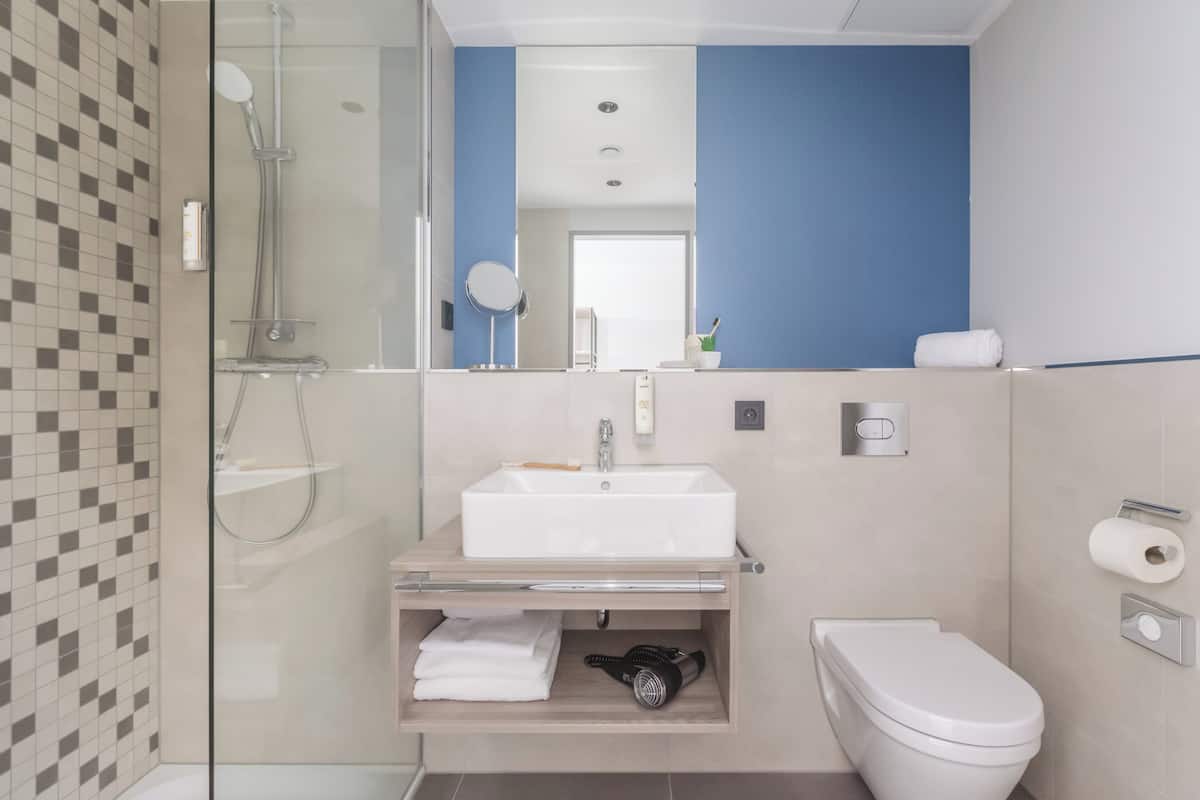 Shower, hair dryer, towels, soap
