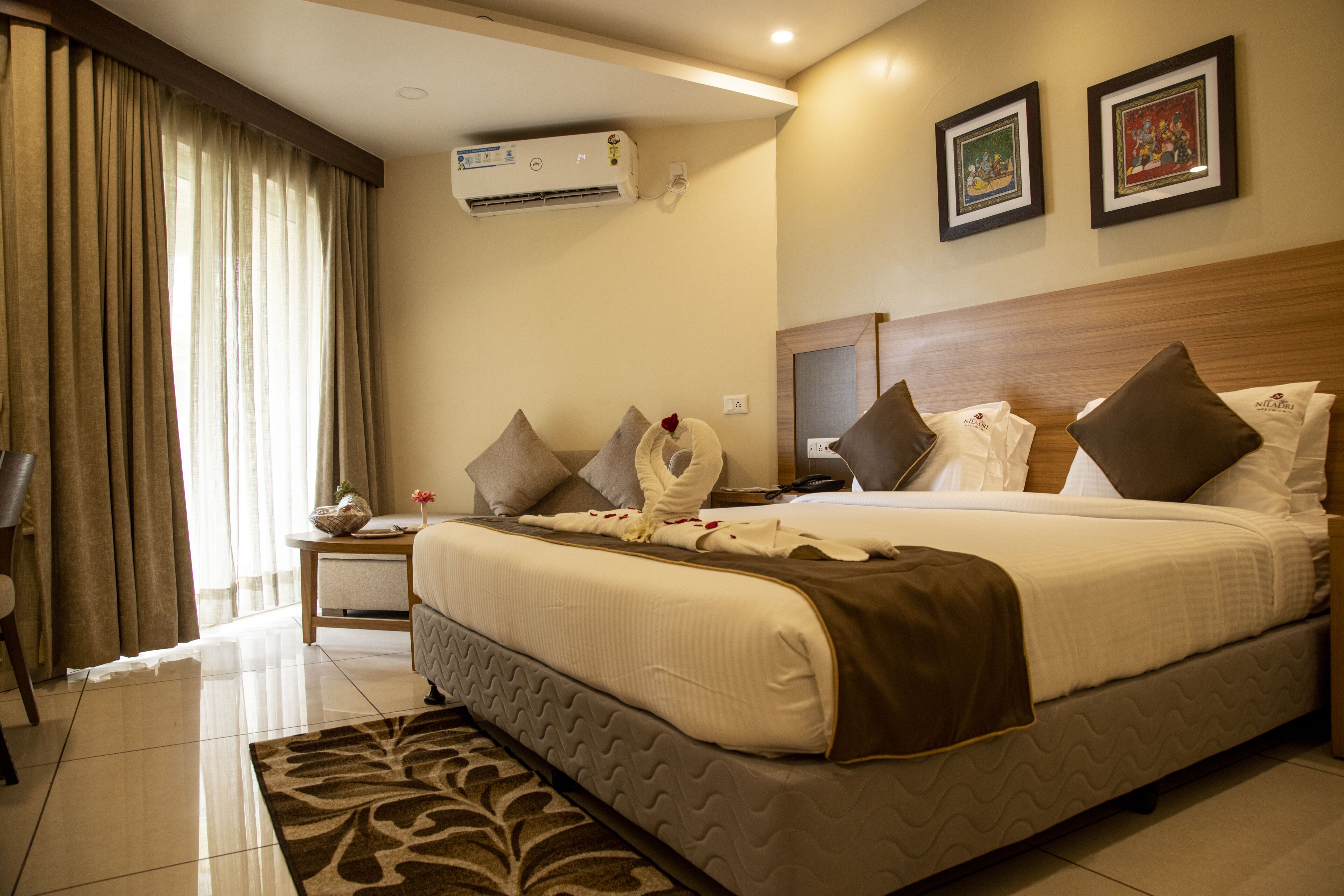 Premium bedding, memory-foam beds, desk, laptop workspace