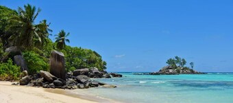 Chez Benoit Self Catering- Au cap, mahe seychelles, beach garden view