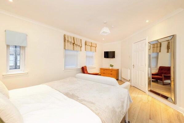 2 bedrooms, desk, iron/ironing board, travel crib