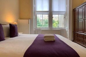 1 dormitorio, tabla de planchar con plancha, cuna de viaje y wifi