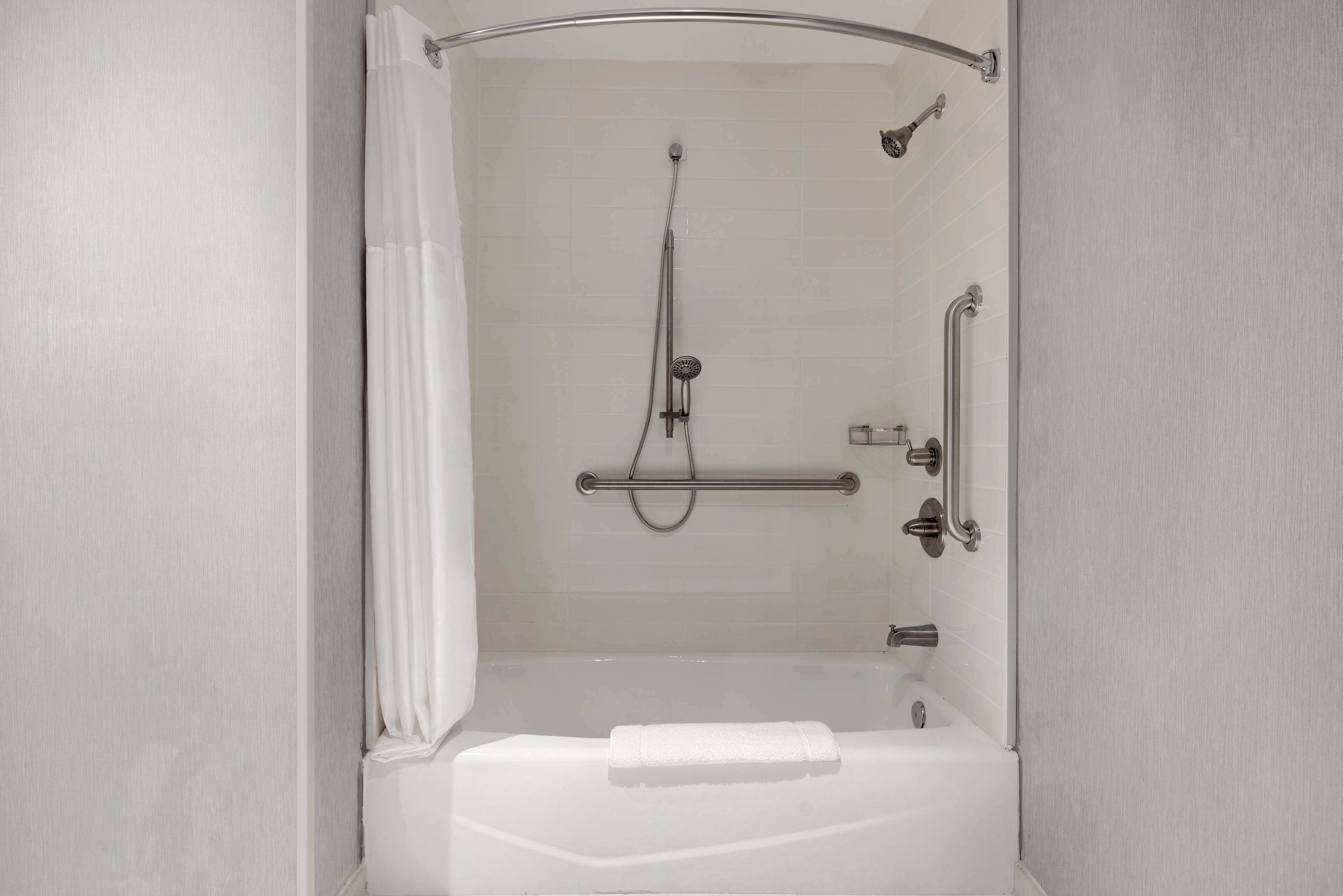 A walk-in shower with a glass door, a handheld showerhead, a handheld showerhead, a handheld showerhead, a handheld showerhead, a handheld showerhead, a handheld showerhead, a handheld showerhead, a handheld showerhead, a handheld showerhead, a handheld showerhead, a handheld showerhead, a handheld showerhead, a handheld showerhead, a handheld showerhead, a handheld showerhead, a handheld showerhead, a handheld showerhead, a handheld showerhead, a handheld showerhead, a handheld showerhead, a handheld showerhead, a handheld showerhead, a handheld showerhead, a handheld showerhead, a handheld showerhead, a handheld showerhead, a handheld showerhead, a handheld showerhead, a handheld showerhead, a handheld showerhead, a handheld showerhead, a handheld showerhead, a handheld showerhead, a handheld showerhead, a handheld showerhead, a handheld showerhead, a handheld showerhead, a handheld shower