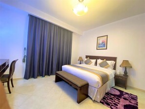 1 bedroom, desk, iron/ironing board, bed sheets