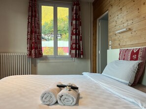 デラックス ダブルまたはツインルーム | WiFi (無料)、ベッドシーツ