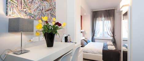 Standard Room | 1 bedroom, in-room safe, desk, blackout curtains