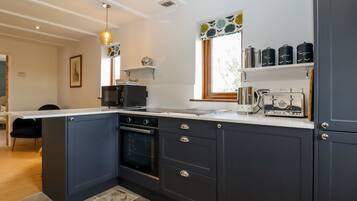 Fridge, dishwasher, electric kettle, cookware/dishes/utensils