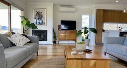 modern family farmhouse with valley views