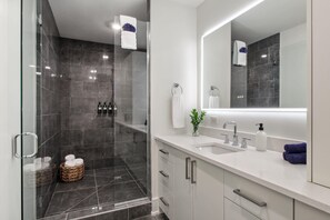 Bathtub, hair dryer, towels, soap
