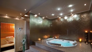 A modern spa room with a hot tub, wooden sauna, and tiled walls. - Large outdoor with privacy, Heated pool 60m2 , Gamesroom ,Wellness, Garden (Karojba)