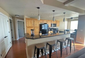Condo, 3 Bedrooms | Private kitchen | Fridge, oven, coffee/tea maker, toaster