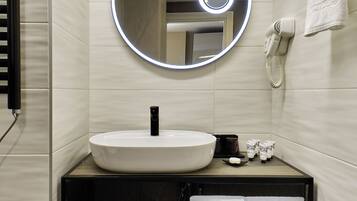 Hair dryer, slippers, towels, soap