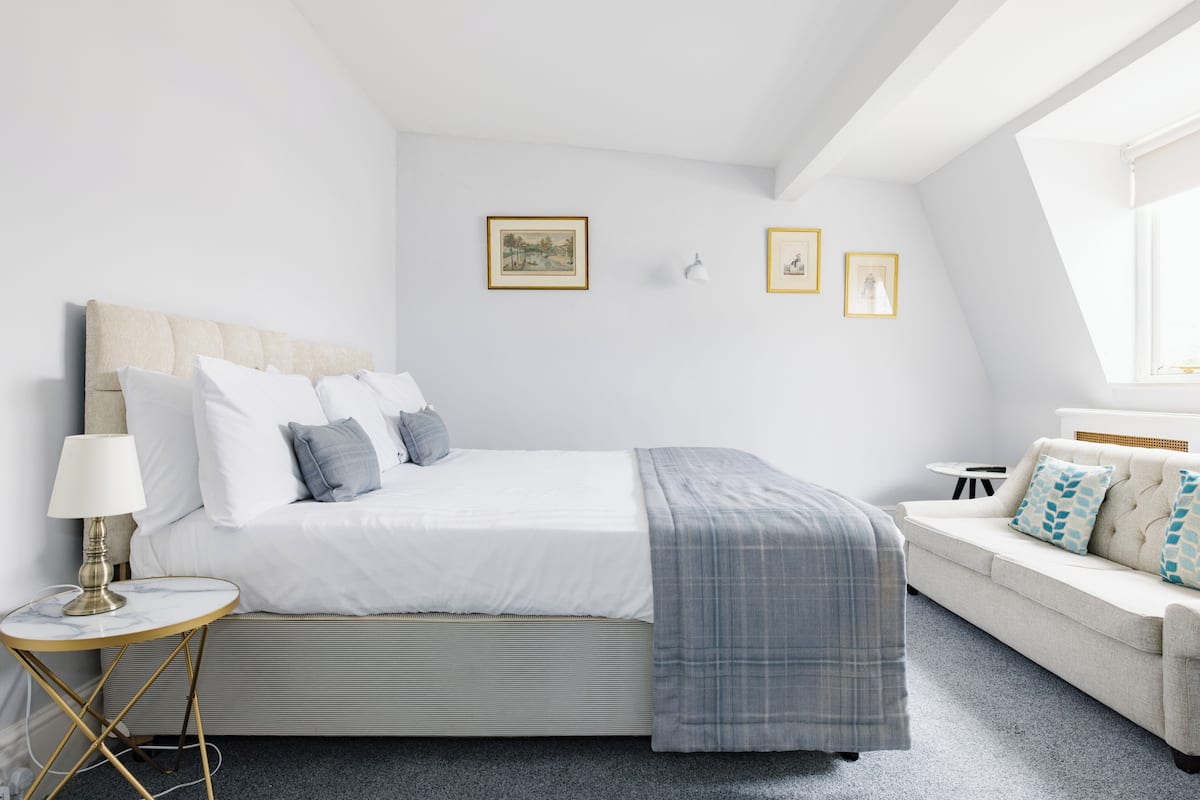 Hypo-allergenic bedding, desk, laptop workspace, iron/ironing board