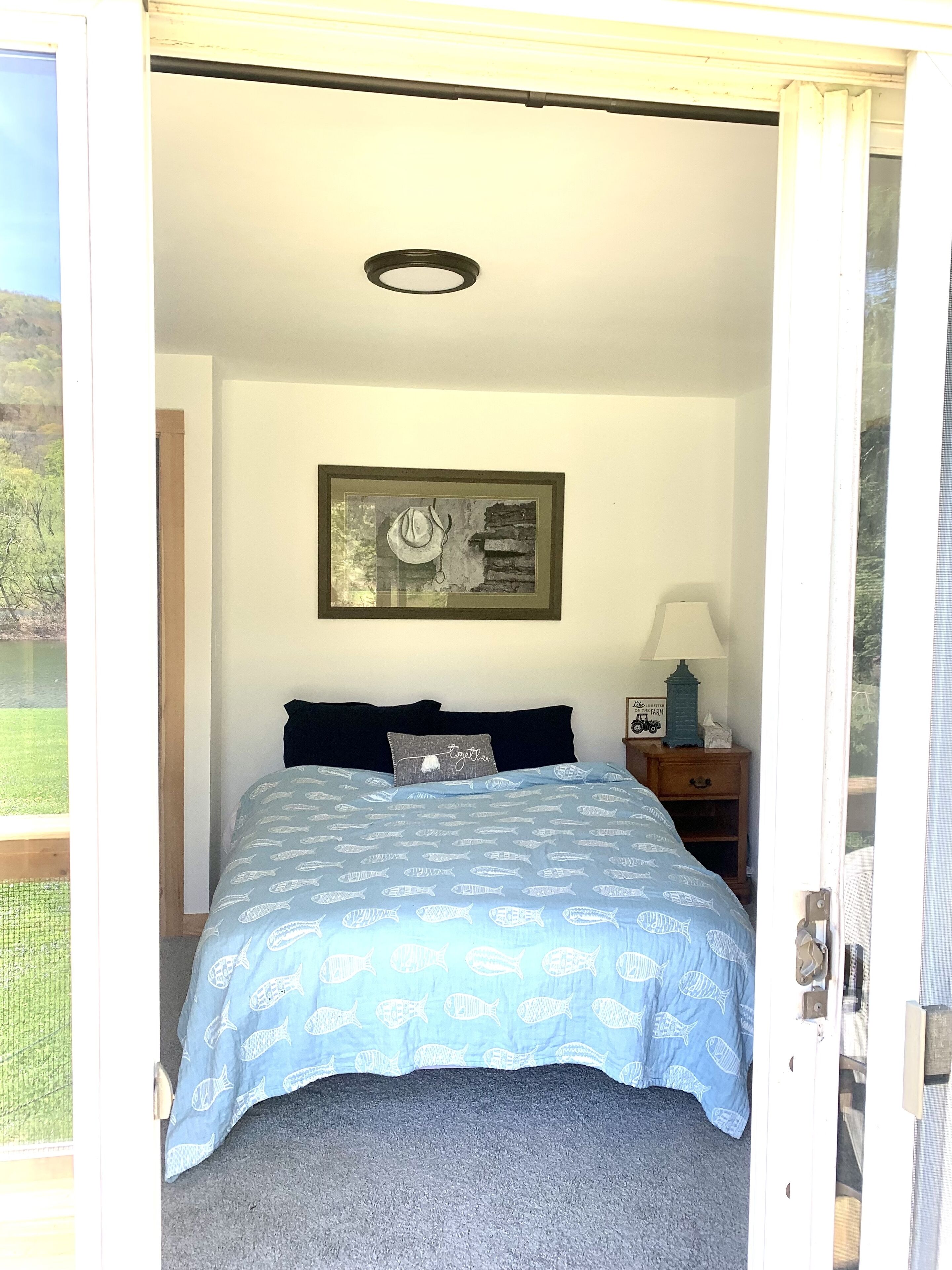 Kayak/Canoe/Fish & Relax right from the backyard of this Riverfront 3 B/R home!