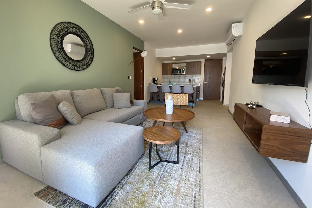 55-inch flat-screen TV with cable channels, TV