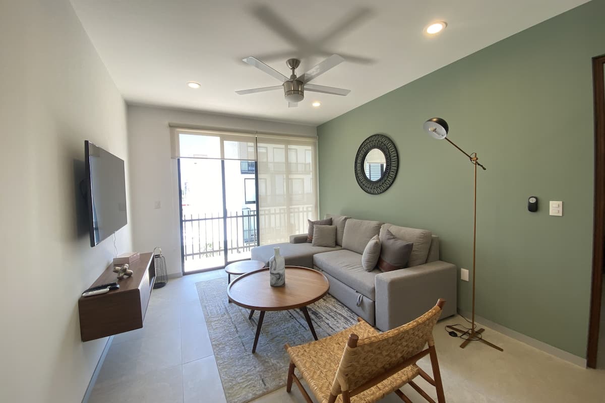 55-inch flat-screen TV with cable channels, TV