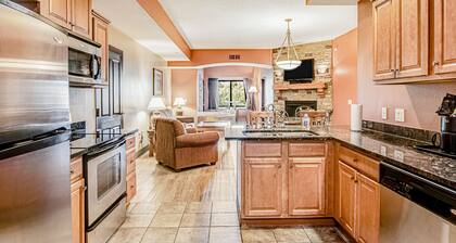 Enchanting condo with fireplace, private hot tub, full kitchen & central AC