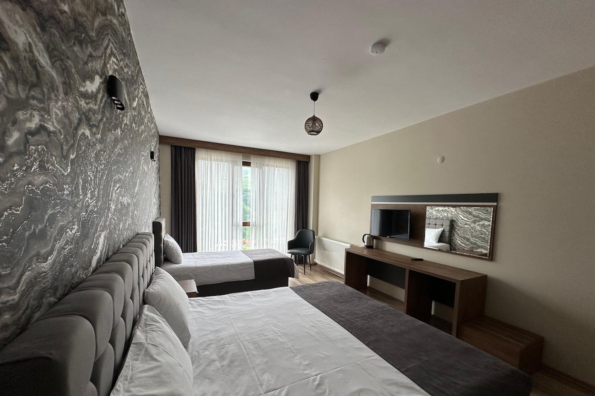 Desk, laptop workspace, free WiFi, bed sheets