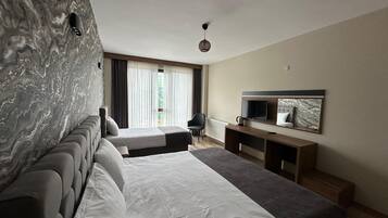 Desk, laptop workspace, free WiFi, bed sheets