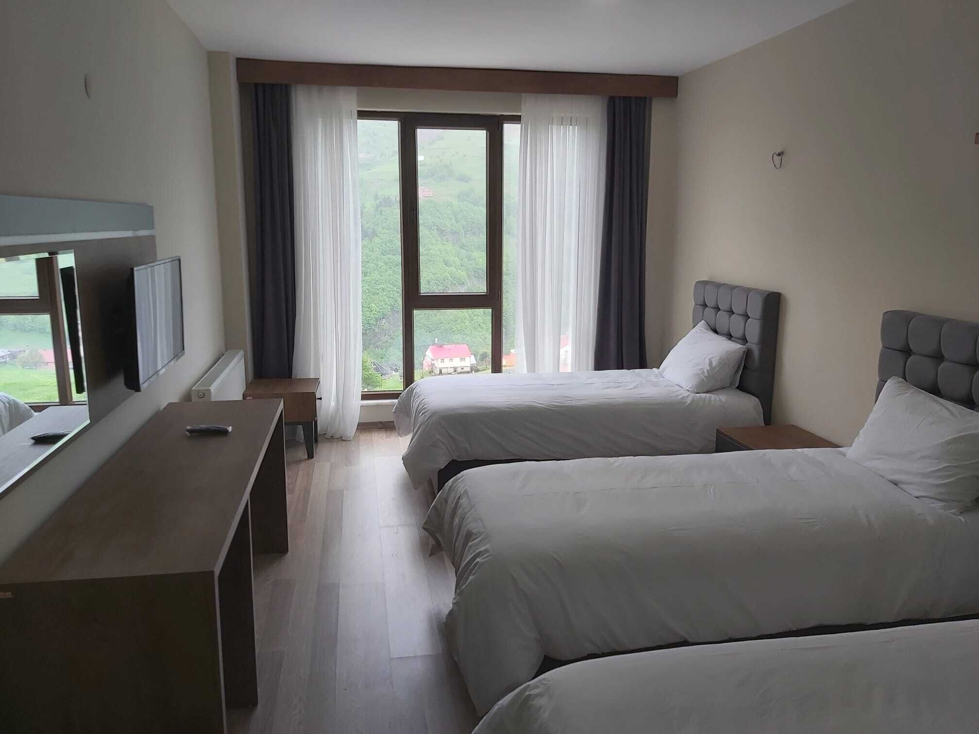 Desk, laptop workspace, free WiFi, bed sheets