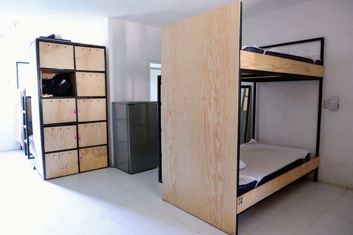 Premium bedding, down comforters, laptop workspace