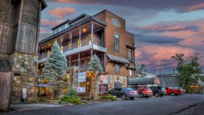 A brick building with a stone facade, multiple balconies, and a sign for 'Perch'. - Perch 3 - Luxury Condo | Downtown Location | Modern and Contemporary (Blue Ridge)