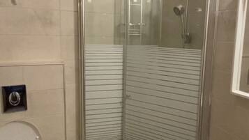 Shower, towels, soap, shampoo