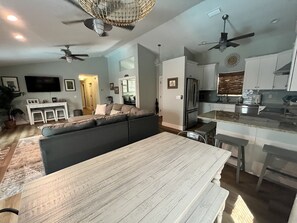 Smart TV, fireplace, books, stereo