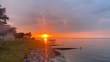 On the beach, sun-loungers, beach towels